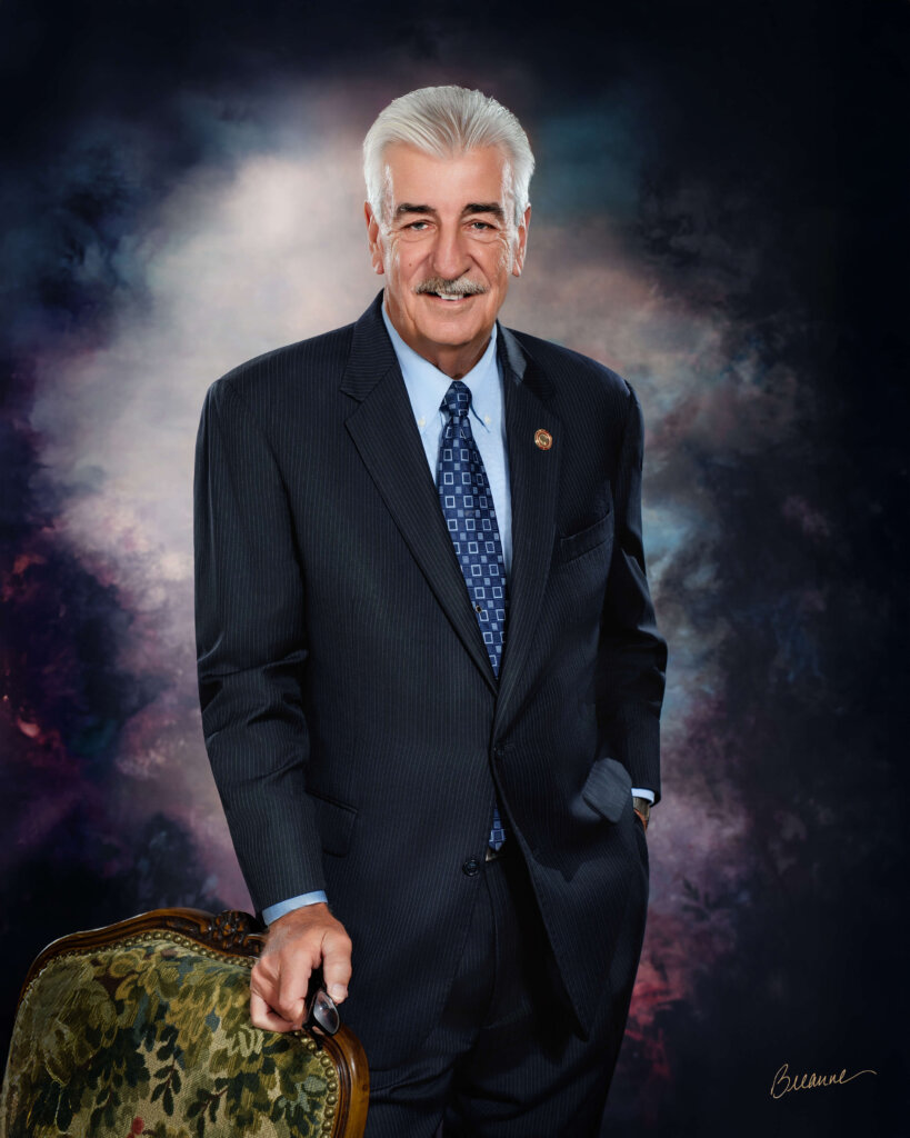 Formal fine art portrait of Joe Knight in navy suit, photographed at Trussville portrait studio near Birmingham Alabama.