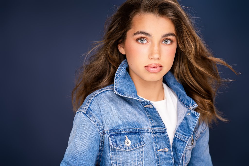 Ireland wearing a denim jacket in a modeling portfolio portrait by Breanne Cook of Breanne Fine Portraiture in Birmingham Alabama