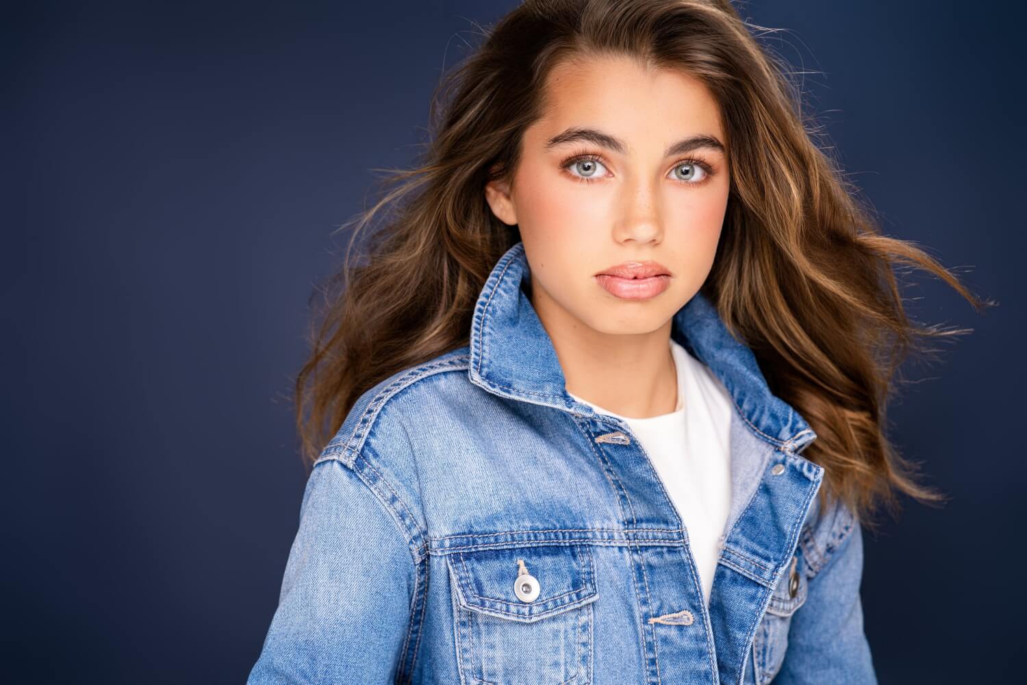 Ireland wearing a denim jacket in a modeling portfolio portrait by Breanne Cook of Breanne Fine Portraiture in Birmingham Alabama